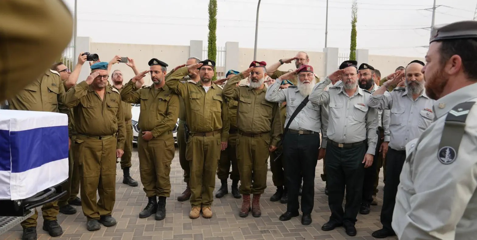 Rabbi Krim salutes Hadar Goldin's casket